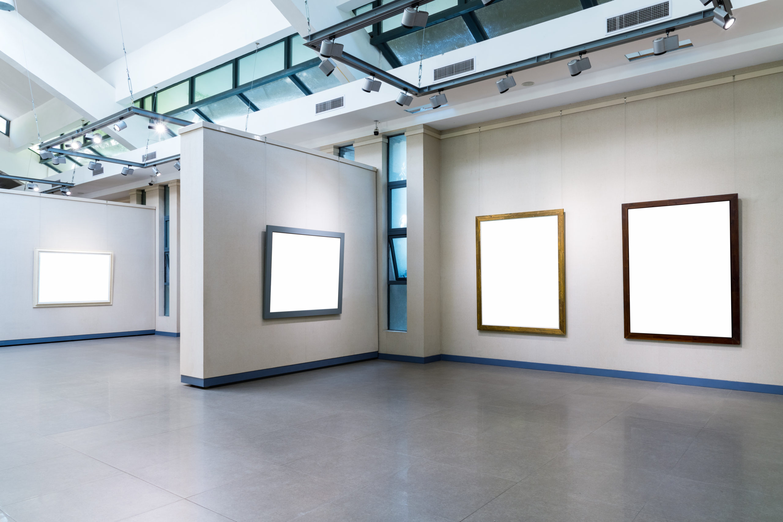 blank frames on exhibition wall in a room